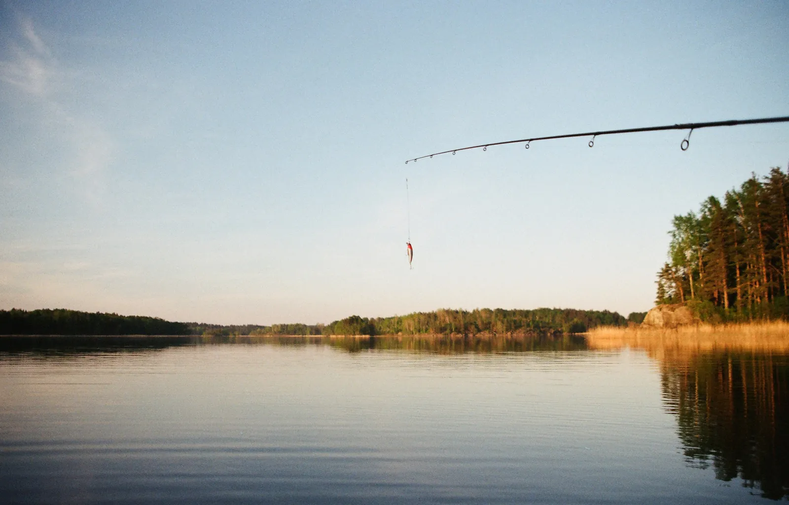 Fishing Rod Over Lake